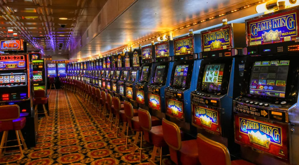 Slot machines and casino floor inside the Big M Casino cruise ship in South Carolina