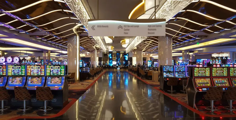 Rows of slot machines inside MGM National Harbor, a casino near Washington DC